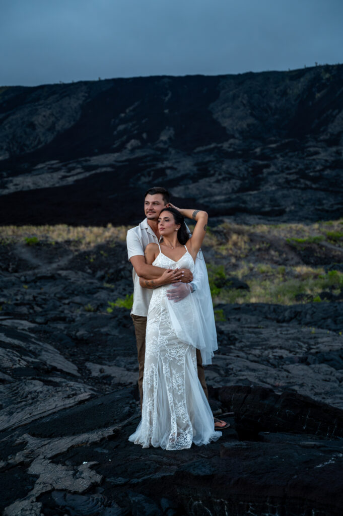 A beautiful couple elopes on a lava flow in Hawai'i's Volcano National Park