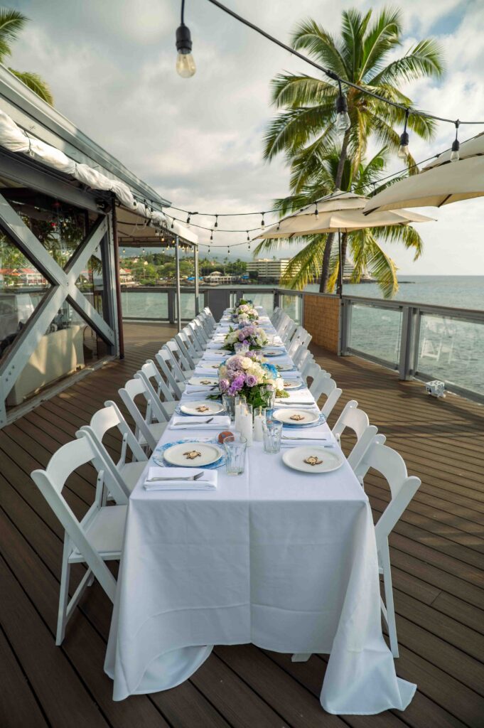 Papa Kona wedding reception table decor overlooking Oneo Bay