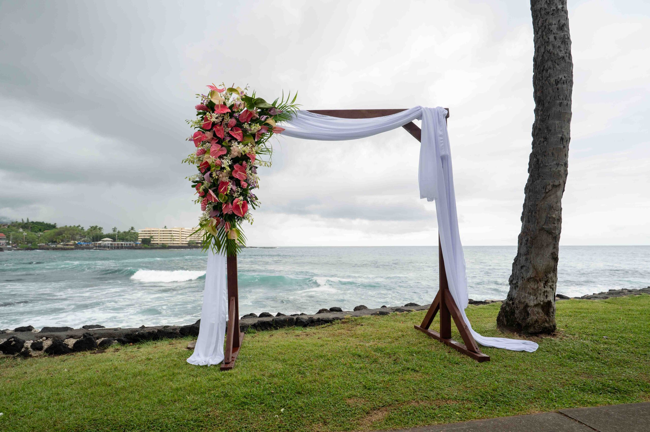 Wedding arch at Papa Kona weddings overlooking Oneo Bay
