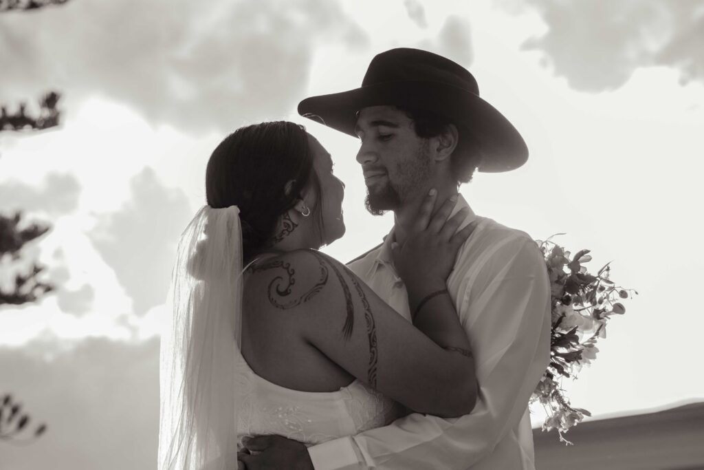A couple embraces on their wedding day