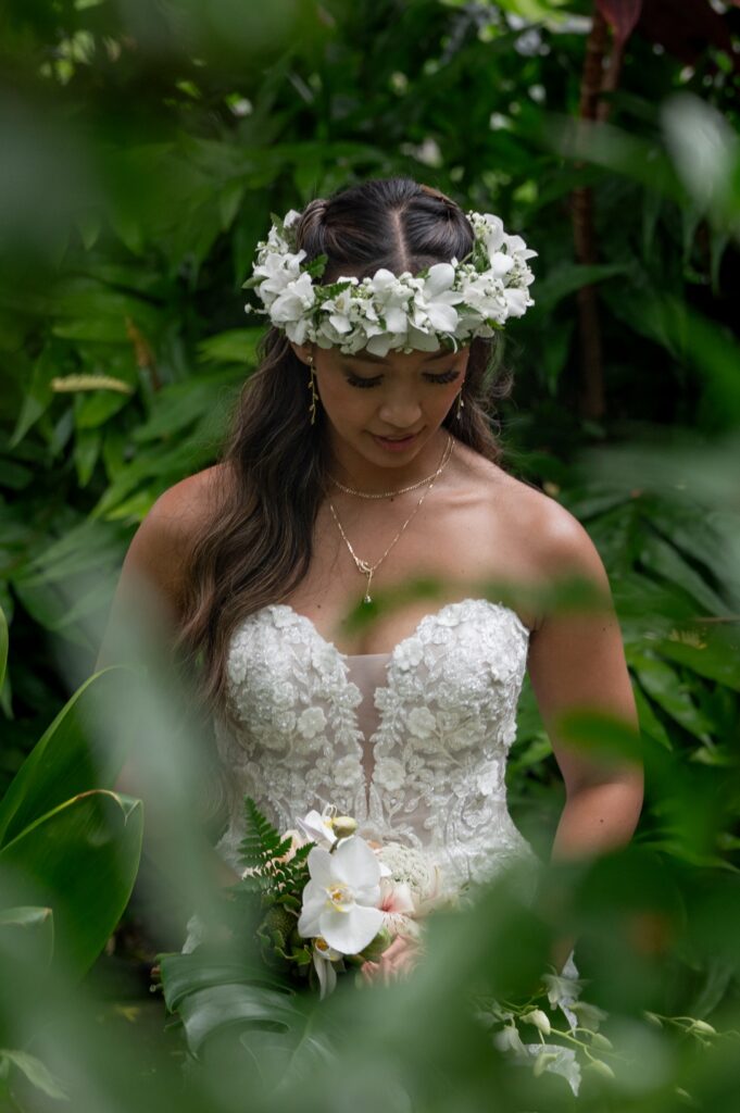 A bride has her portrait taken just before her Outrigger Kona wedding