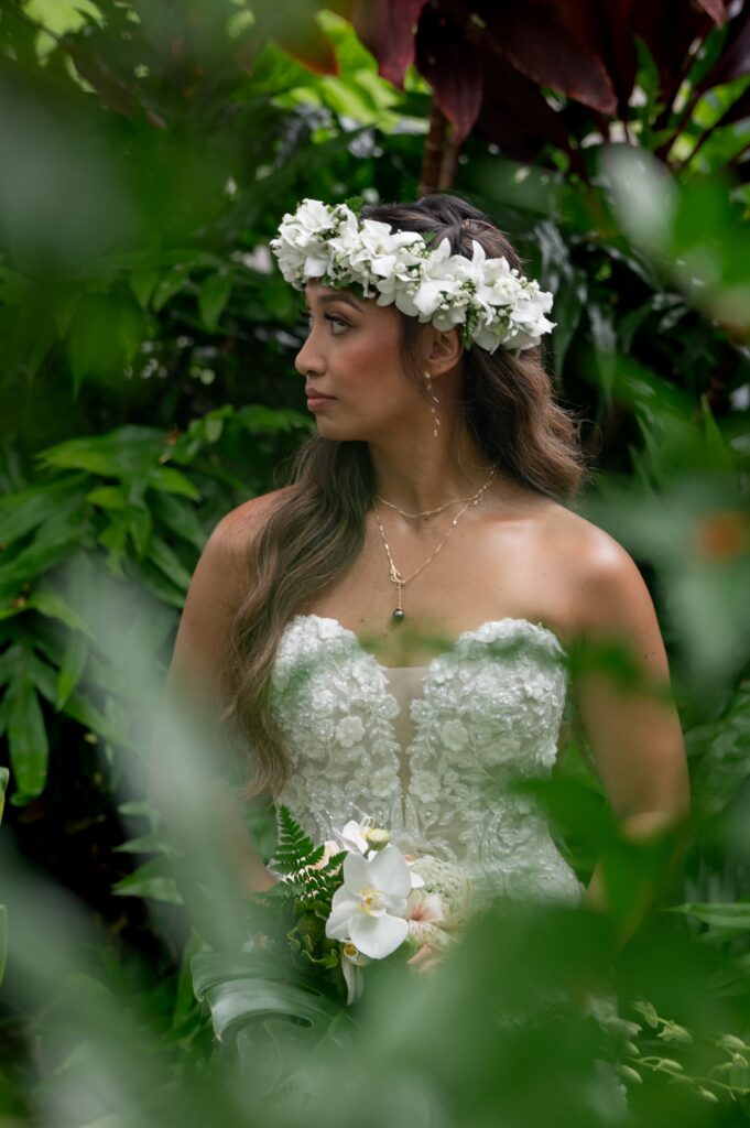 A bride has her portrait taken just before her Outrigger Kona wedding